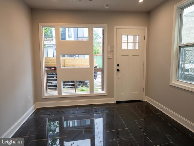 2005 N Lawrence St, Philadelphia, PA 19122 - foyer with baseboards, recessed lighting, and dark marble finish flooring