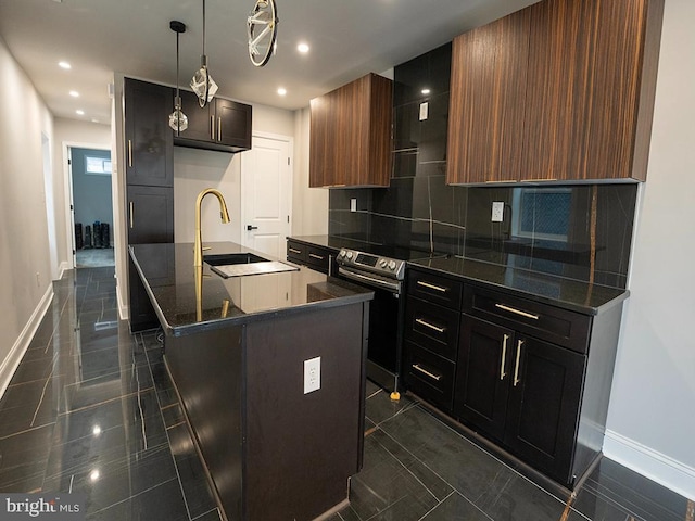 2005 N Lawrence St, Philadelphia, PA 19122 - kitchen with baseboards, a sink, stainless steel electric stove, backsplash, and recessed lighting