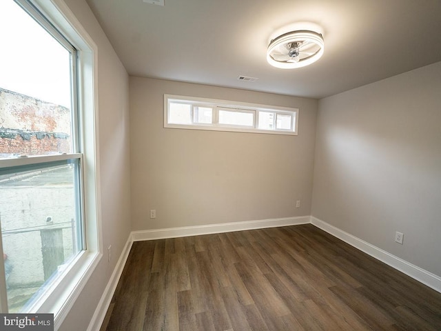 2005 N Lawrence St, Philadelphia, PA 19122 - spare room featuring dark wood-style flooring and baseboards