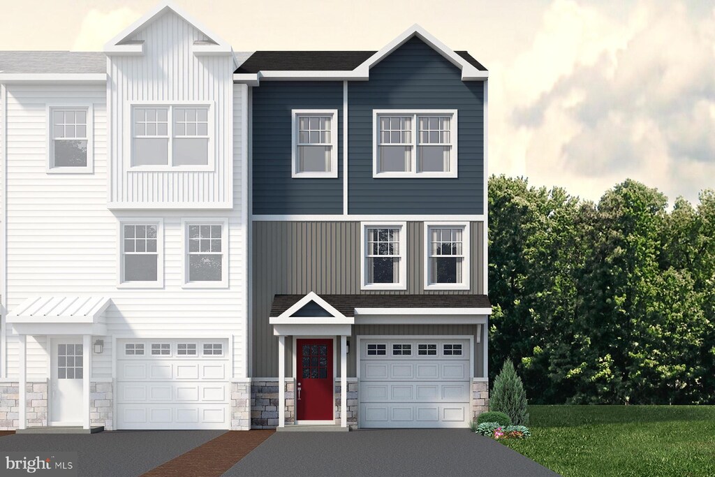 128 Dolomite Dr, Port Matilda, PA 16870 - townhome / multi-family property with a garage and stone siding