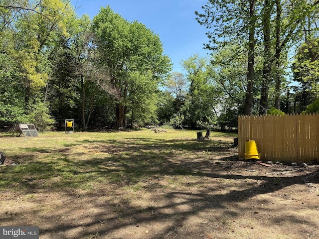 view of yard with fence