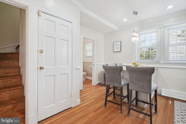 1614 Grace Church Rd, Silver Spring, MD 20910 - dining space featuring crown molding, recessed lighting, baseboards, light wood-type flooring, and stairway