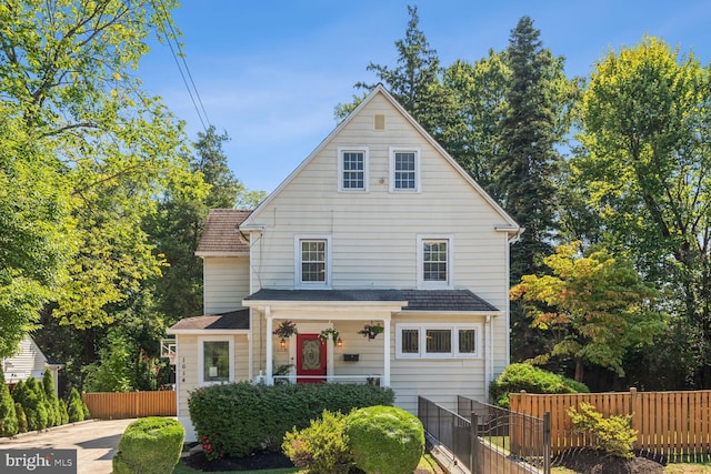 1614 Grace Church Rd, Silver Spring, MD 20910 - traditional style home with a porch and fence