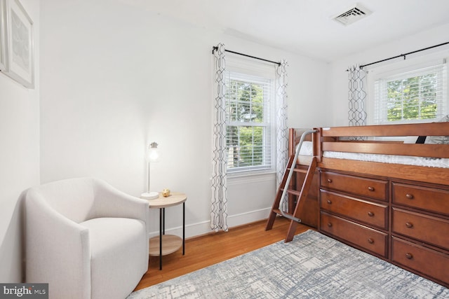 1614 Grace Church Rd, Silver Spring, MD 20910 - bedroom with baseboards, visible vents, and wood finished floors