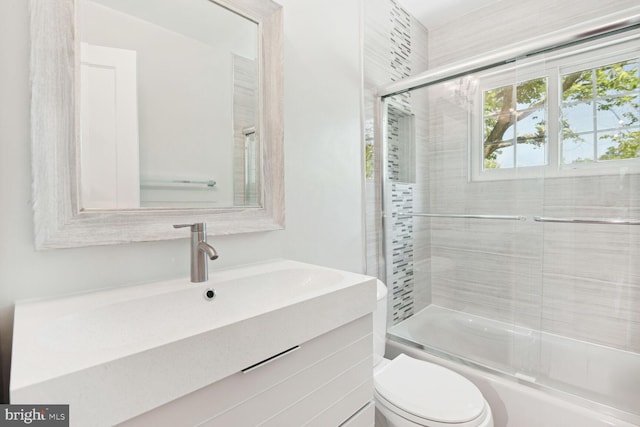 1614 Grace Church Rd, Silver Spring, MD 20910 - full bathroom featuring vanity, combined bath / shower with glass door, and toilet
