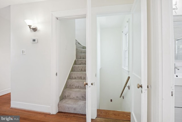 1614 Grace Church Rd, Silver Spring, MD 20910 - stairs featuring baseboards and wood finished floors