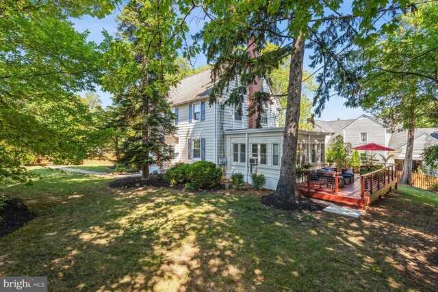 1614 Grace Church Rd, Silver Spring, MD 20910 - back of house featuring a lawn, fence, and a deck