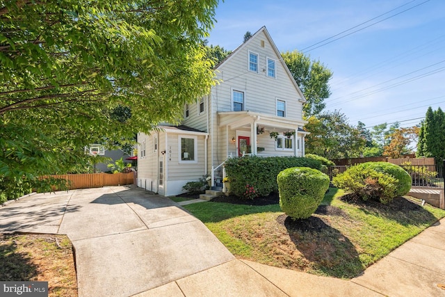 1614 Grace Church Rd, Silver Spring, MD 20910 - view of front of property with a porch and fence