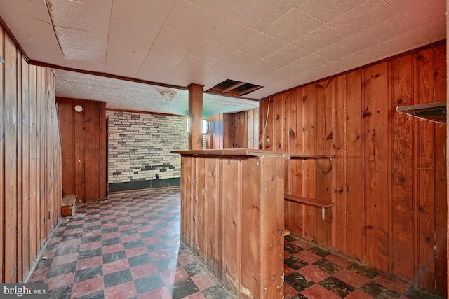 4707 Wrenwood Ave, Baltimore, MD 21212 - bar featuring tile patterned floors, wood walls, and a dry bar