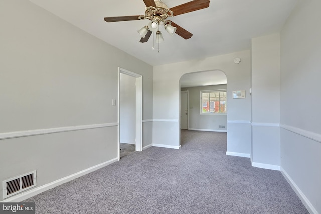 4707 Wrenwood Ave, Baltimore, MD 21212 - carpeted empty room featuring a ceiling fan, arched walkways, visible vents, and baseboards