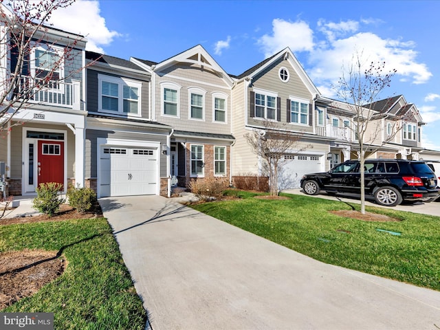 24239 Canoe Dr Unit 204, Millsboro, DE 19966 - multi unit property featuring driveway, an attached garage, stone siding, and a front lawn