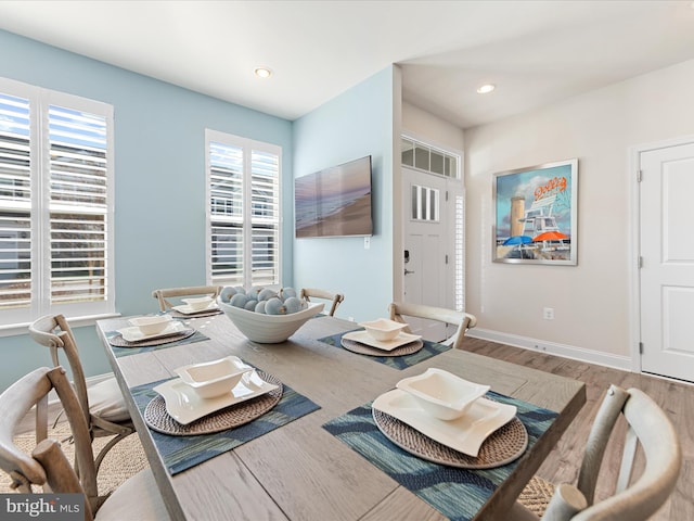 24239 Canoe Dr Unit 204, Millsboro, DE 19966 - dining room featuring wood finished floors, baseboards, and recessed lighting