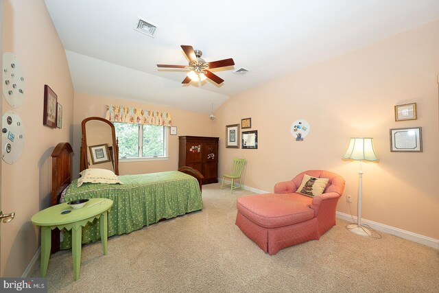 carpeted bedroom featuring ceiling fan, baseboards, lofted ceiling, and visible vents
