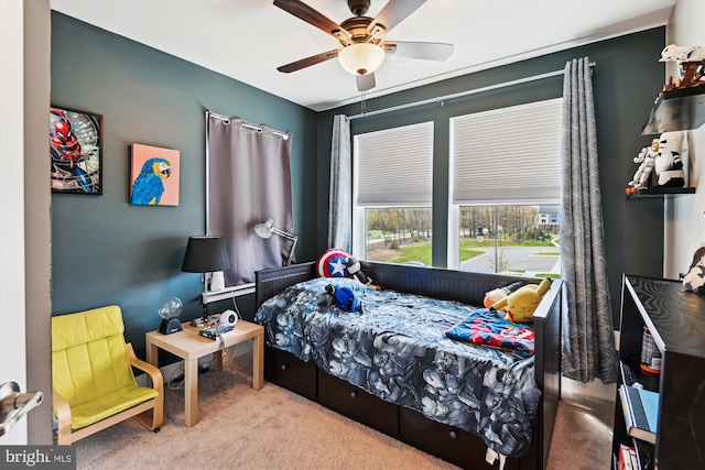 carpeted bedroom with ceiling fan