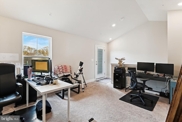 carpeted home office with lofted ceiling and recessed lighting