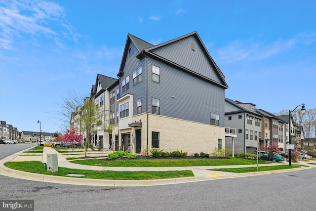view of property exterior featuring a residential view