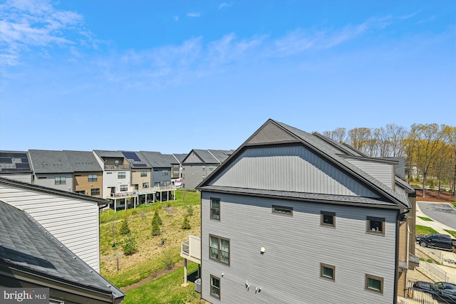 view of property exterior featuring a residential view