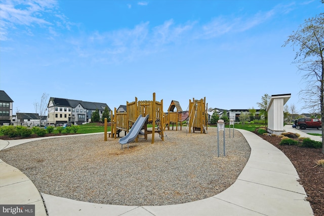 community jungle gym featuring a residential view