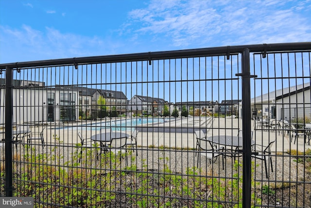 pool featuring fence