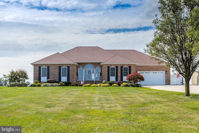 180 Featherbed Ln, Pilesgrove, NJ 08098 - view of front of home with brick siding, a front lawn, and an attached garage