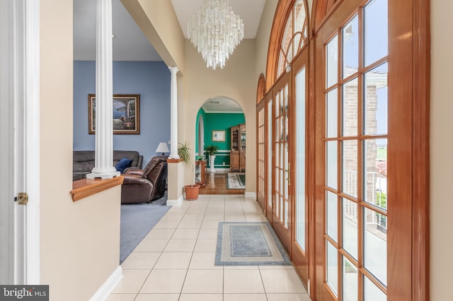 180 Featherbed Ln, Pilesgrove, NJ 08098 - corridor with arched walkways, french doors, baseboards, decorative columns, and light tile patterned floors