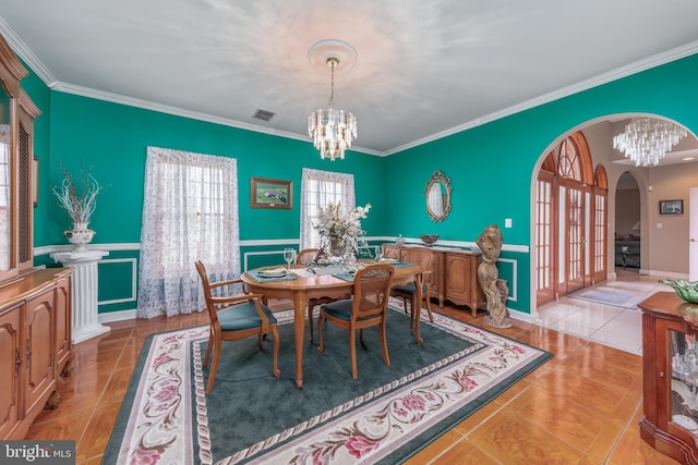 180 Featherbed Ln, Pilesgrove, NJ 08098 - tiled dining space featuring visible vents, arched walkways, a notable chandelier, and ornamental molding