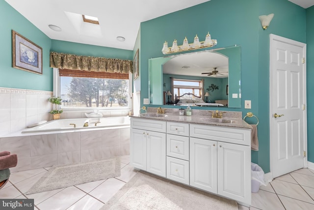 180 Featherbed Ln, Pilesgrove, NJ 08098 - bathroom featuring a sink, tile patterned floors, a healthy amount of sunlight, and connected bathroom