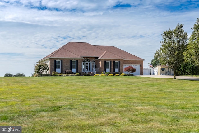 180 Featherbed Ln, Pilesgrove, NJ 08098 - view of front of house featuring an attached garage, concrete driveway, a front lawn, and brick siding