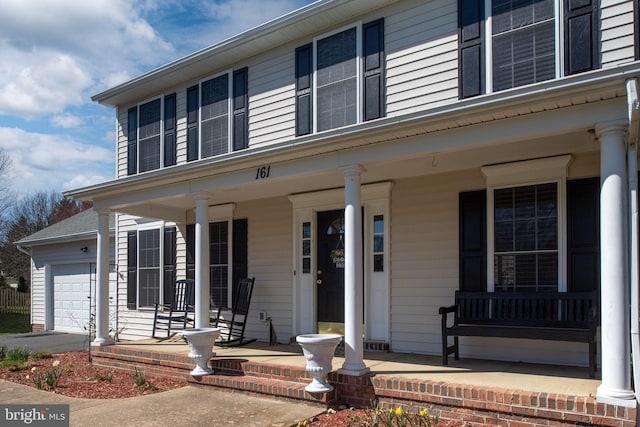 161 Bush Hill Ct, Fredericksburg, VA 22405 - view of front of house featuring covered porch, a garage, and aphalt driveway