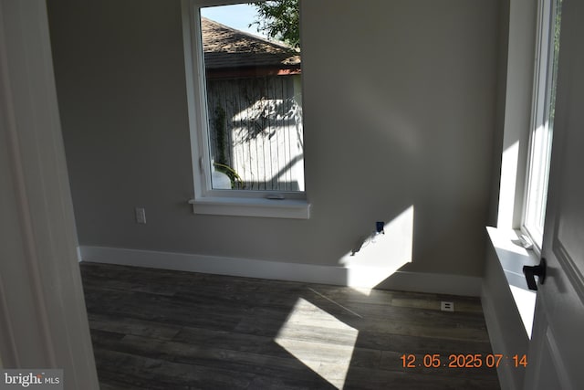 31 Riverview Ave, Chesapeake City, MD 21915 - unfurnished room featuring baseboards, plenty of natural light, and wood finished floors