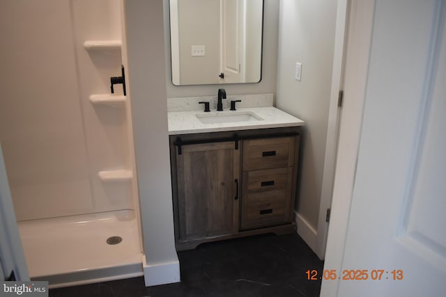 31 Riverview Ave, Chesapeake City, MD 21915 - bathroom with vanity, a shower stall, and baseboards