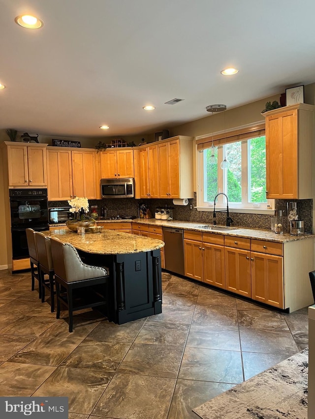 1388 Old Barn Cir, Downingtown, PA 19335 - kitchen with dishwashing machine, a sink, stainless steel microwave, tasteful backsplash, and light stone countertops