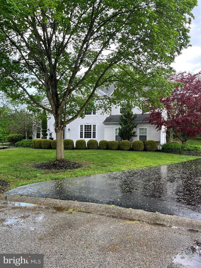 1388 Old Barn Cir, Downingtown, PA 19335 - view of front of property with a front yard and stucco siding
