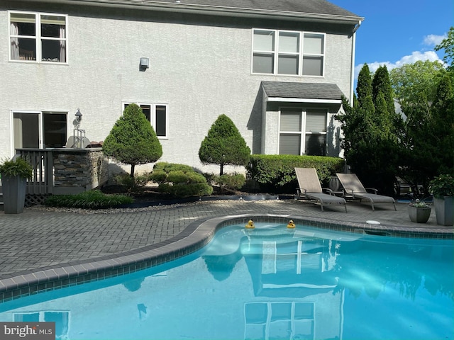 1388 Old Barn Cir, Downingtown, PA 19335 - outdoor pool with a patio area