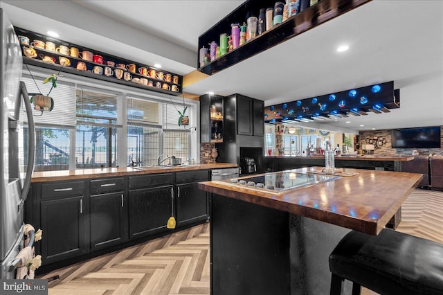 280 Hollywood Beach Rd, Chesapeake City, MD 21915 - bar area with black electric stovetop, recessed lighting, and a sink