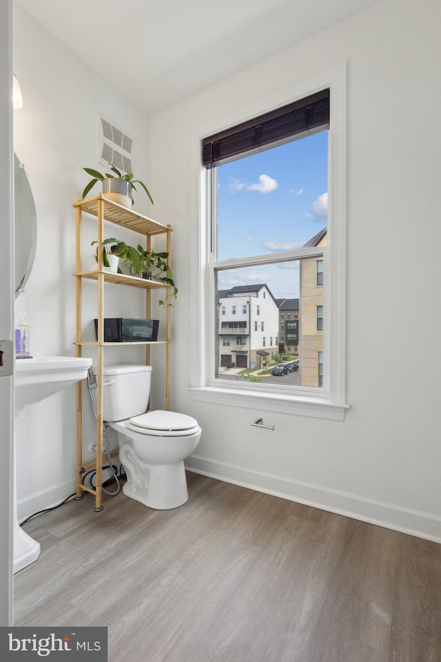 4902 Longmire Way Unit 24, Chantilly, VA 20151 - bathroom featuring wood finished floors, toilet, and baseboards