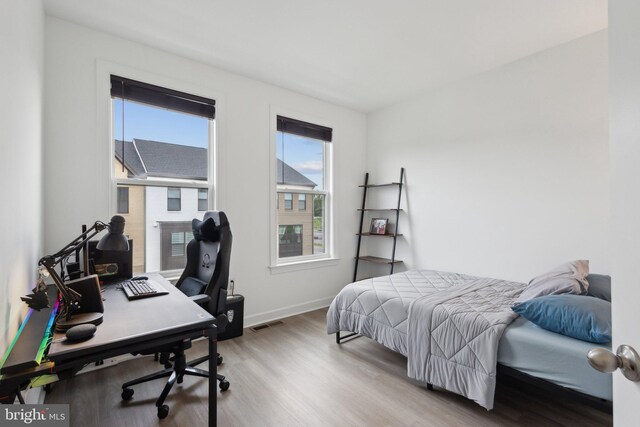 4902 Longmire Way Unit 24, Chantilly, VA 20151 - bedroom featuring wood finished floors, baseboards, and a desk