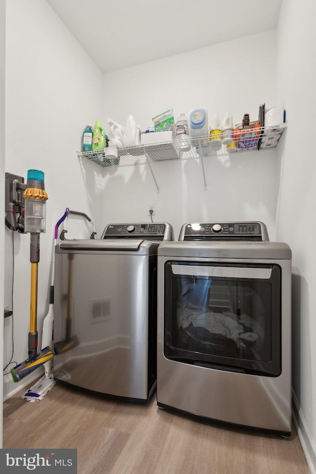 4902 Longmire Way Unit 24, Chantilly, VA 20151 - laundry room featuring independent washer and dryer and wood finished floors
