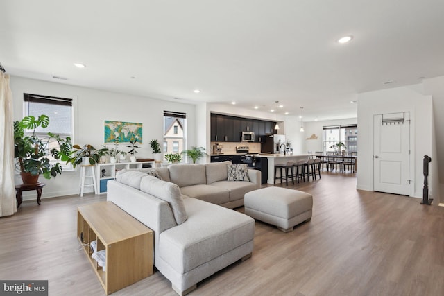 4902 Longmire Way Unit 24, Chantilly, VA 20151 - living room featuring light wood finished floors, recessed lighting, and baseboards