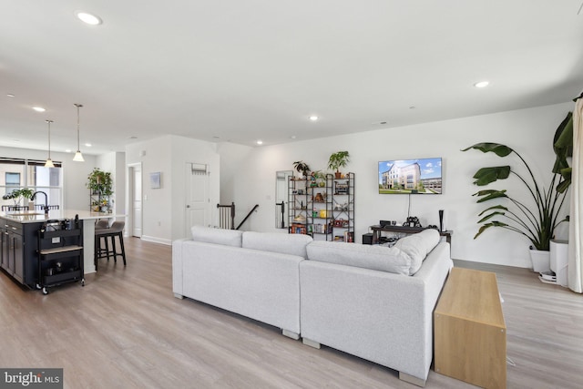 4902 Longmire Way Unit 24, Chantilly, VA 20151 - living area with light wood finished floors, recessed lighting, and baseboards