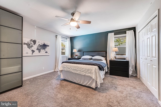 7306 Wayne Dr, Annandale, VA 22003 - carpeted bedroom featuring baseboards, multiple windows, a ceiling fan, and a closet