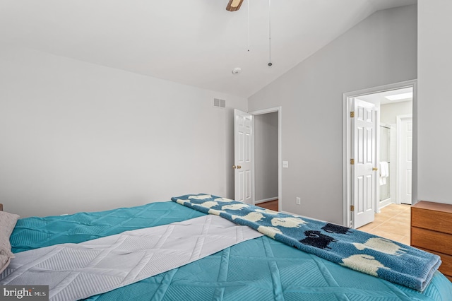 bedroom featuring visible vents, ensuite bath, high vaulted ceiling, a ceiling fan, and light tile patterned floors