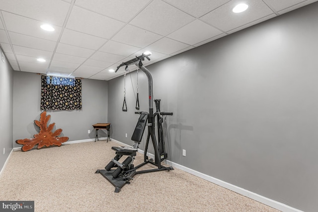 workout room with baseboards, recessed lighting, carpet floors, and a drop ceiling
