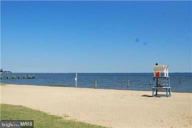 property view of water featuring a view of the beach