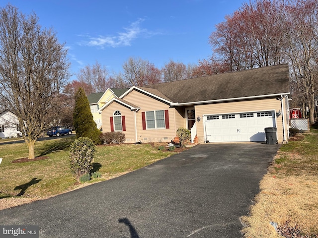 ranch-style house featuring a garage, driveway, crawl space, and a front lawn