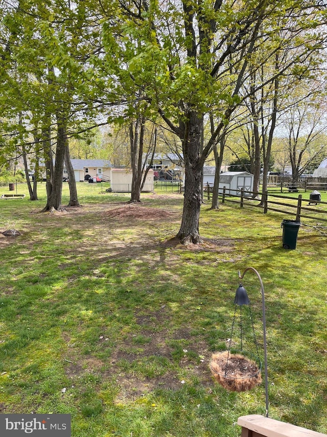 view of yard featuring fence