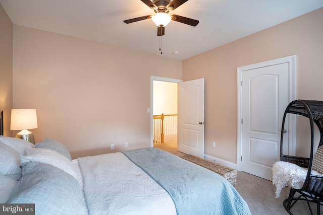 bedroom featuring baseboards, carpet, and a ceiling fan