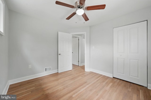 505 N Naylor St, Alexandria, VA 22304 - unfurnished bedroom featuring light wood-style floors, baseboards, a closet, and a ceiling fan