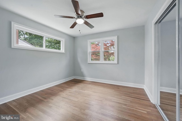 505 N Naylor St, Alexandria, VA 22304 - unfurnished bedroom with a closet, wood finished floors, baseboards, and a ceiling fan