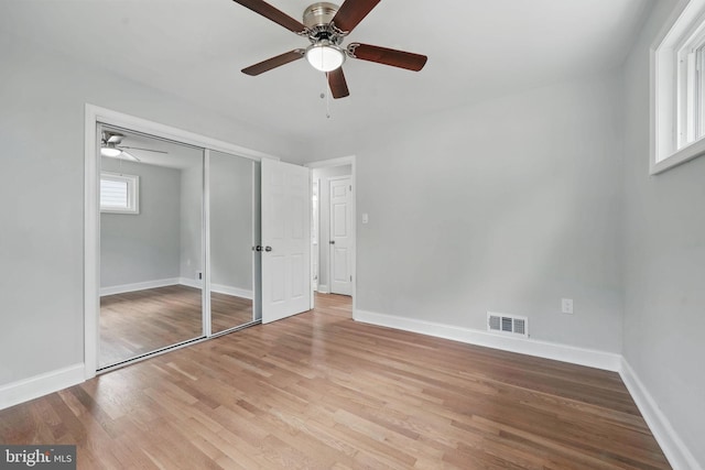 505 N Naylor St, Alexandria, VA 22304 - unfurnished bedroom featuring wood finished floors, baseboards, a closet, and a ceiling fan